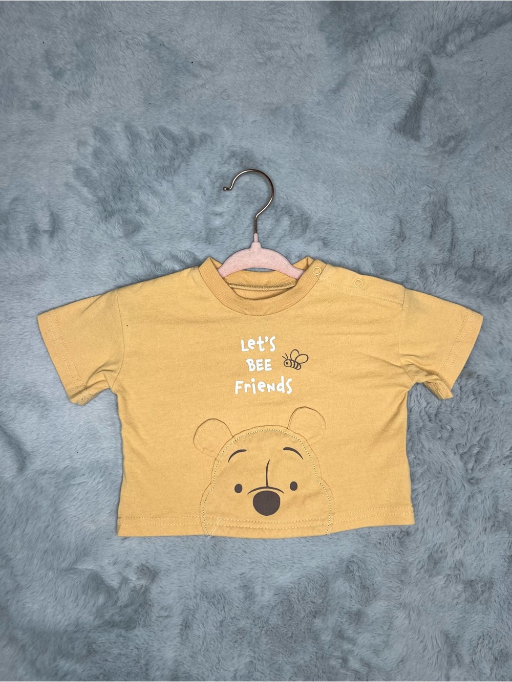 yellow Winnie the Pooh shirt